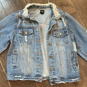 Ripped denim jacket
